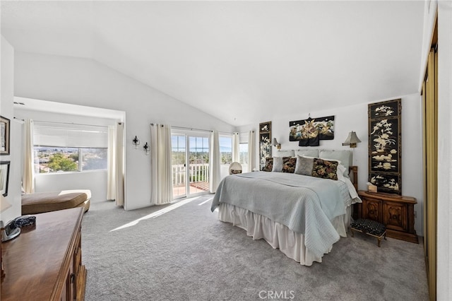 bedroom featuring access to exterior, vaulted ceiling, and carpet