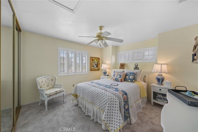 carpeted bedroom featuring ceiling fan