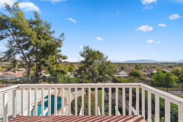 balcony featuring a mountain view