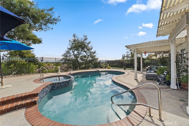 view of swimming pool featuring an in ground hot tub, a pergola, and a patio area