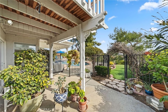 view of patio featuring a fenced in pool