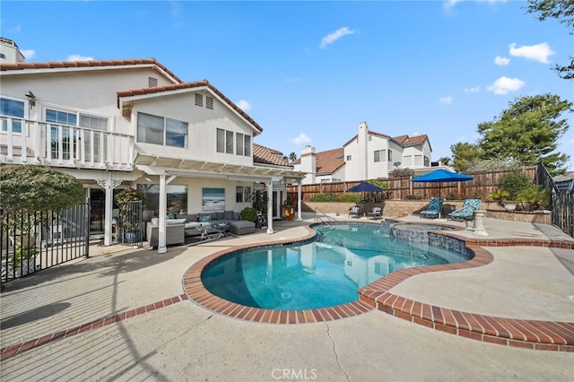 view of swimming pool with an outdoor living space, a patio, an in ground hot tub, and a pergola