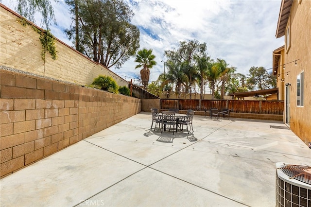 view of patio featuring cooling unit