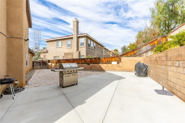 view of patio / terrace featuring a grill