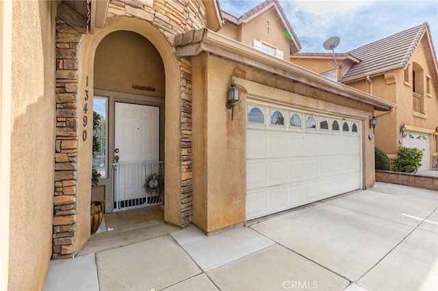 entrance to property with a garage