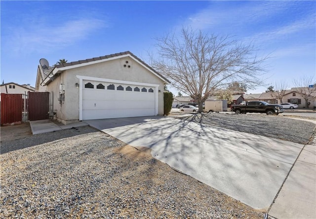 view of property exterior with a garage