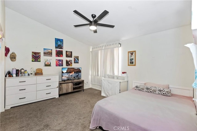 bedroom with vaulted ceiling, ceiling fan, and carpet