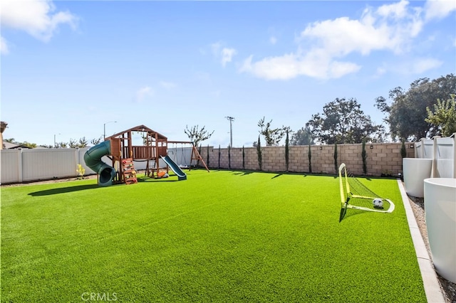 view of yard featuring a playground