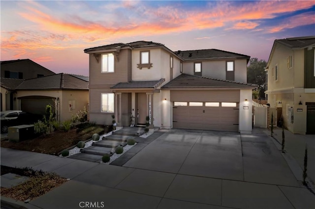 view of front of home with a garage