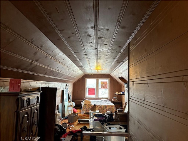 bonus room featuring lofted ceiling, wood ceiling, and wooden walls