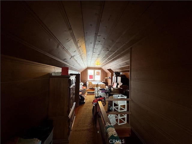 bonus room with lofted ceiling, carpet, wooden ceiling, and wood walls