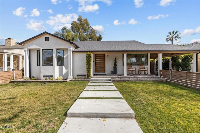 view of front of property featuring a porch and a front lawn