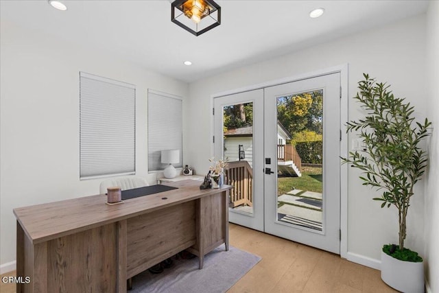 office area featuring light hardwood / wood-style flooring and french doors