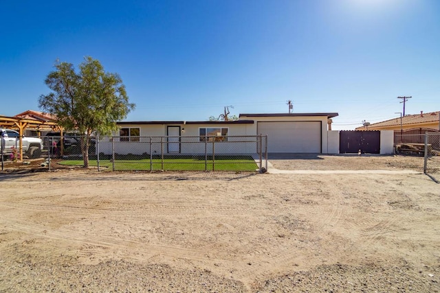 ranch-style house featuring a garage