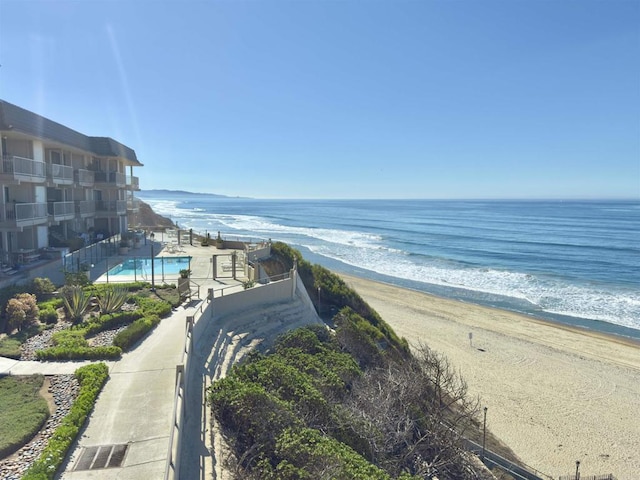 view of water feature with a beach view