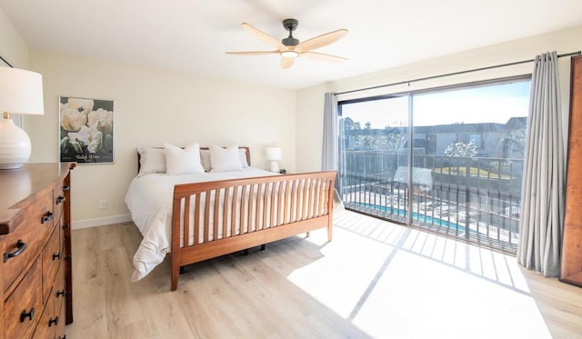 bedroom featuring access to exterior, ceiling fan, and light wood-type flooring