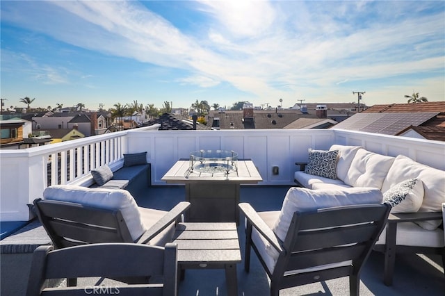 view of patio / terrace with an outdoor living space and a balcony