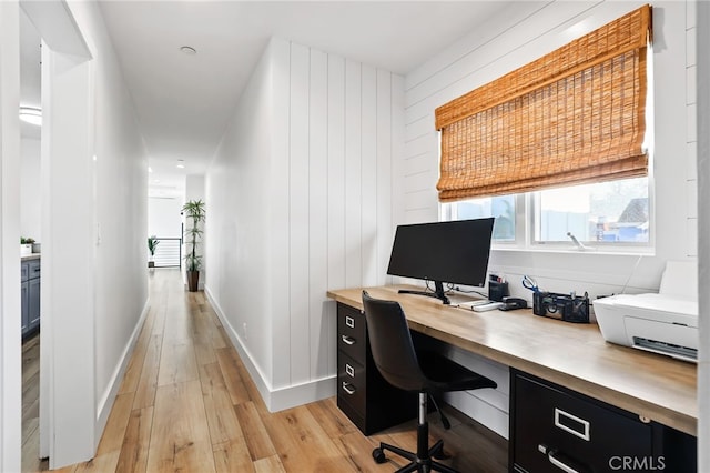 office space with light hardwood / wood-style flooring