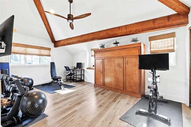 workout room featuring ceiling fan, lofted ceiling, and light wood-type flooring