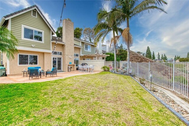 view of yard featuring an outdoor living space and a patio area