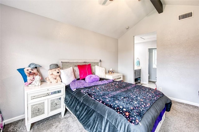 carpeted bedroom with vaulted ceiling with beams