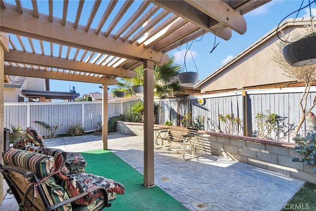 view of patio / terrace featuring a pergola