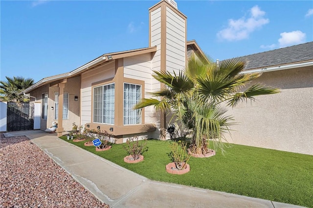 view of front of property with a front yard