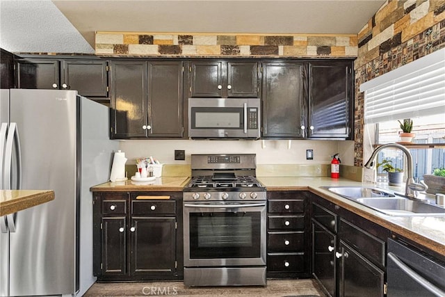 kitchen featuring sink and appliances with stainless steel finishes