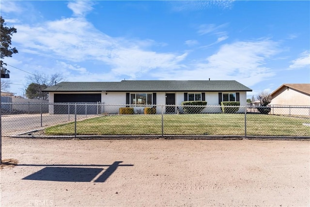 ranch-style home with a garage and a front yard