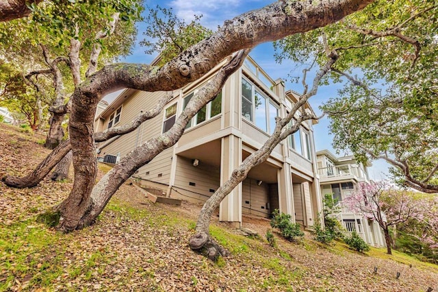 view of home's exterior featuring a balcony