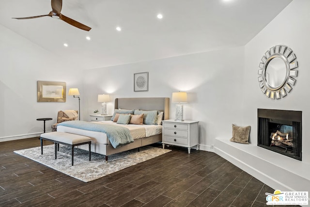 bedroom featuring dark hardwood / wood-style flooring and ceiling fan