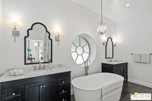 bathroom featuring vanity and a bathtub