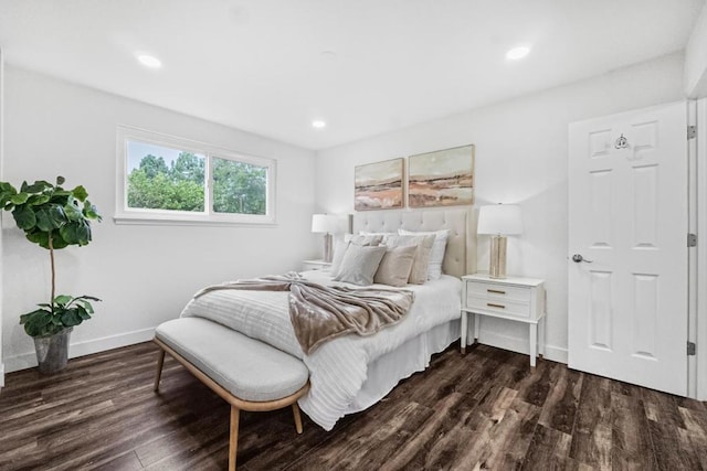 bedroom featuring dark wood-type flooring