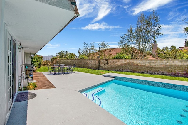 view of pool featuring a patio area