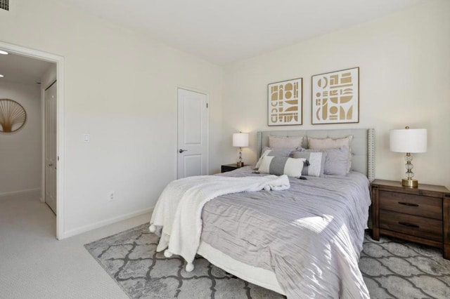 bedroom with light carpet