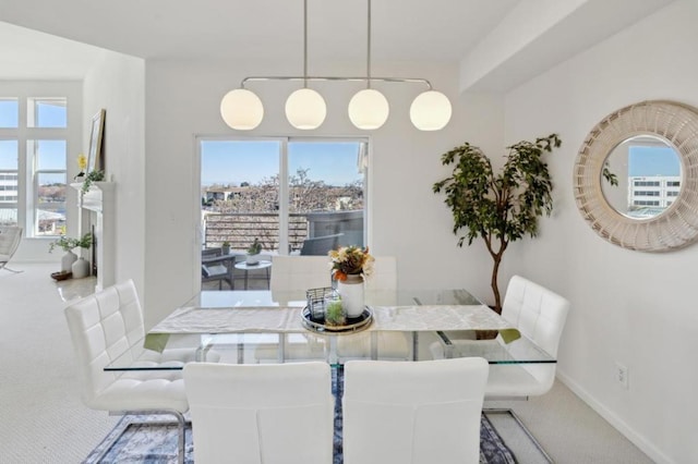 view of carpeted dining space