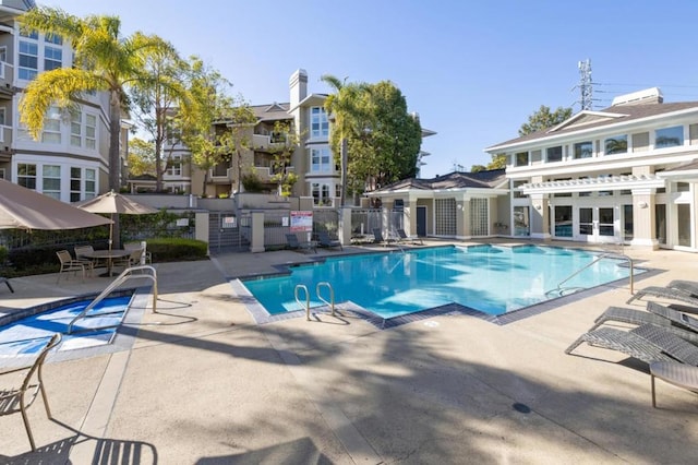 view of swimming pool featuring a patio