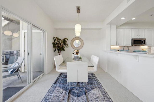 view of carpeted dining room