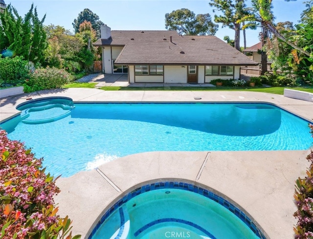 view of pool featuring a patio