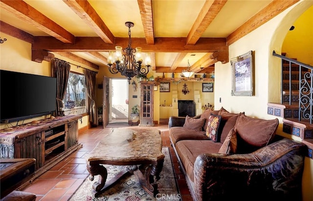 living room featuring beamed ceiling and a notable chandelier