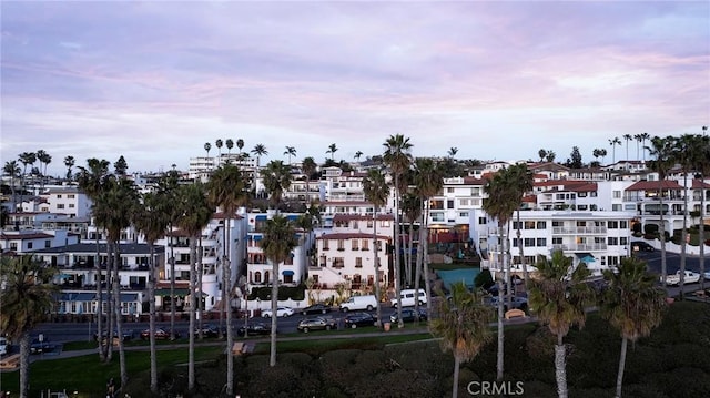 view of outdoor building at dusk