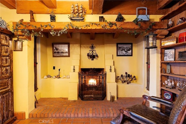 living area featuring brick floor