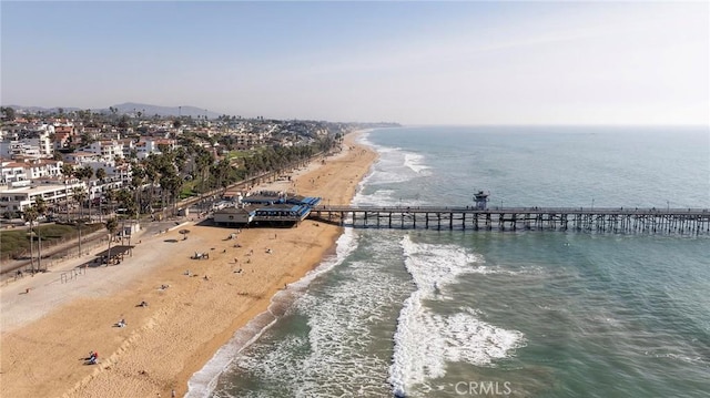 bird's eye view with a view of the beach and a water view