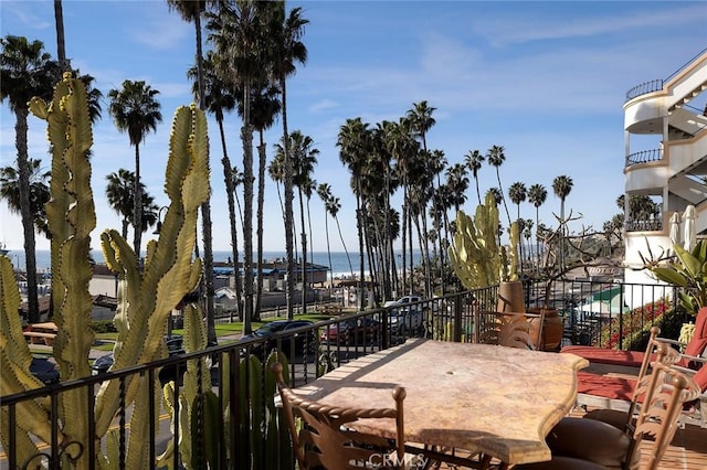 view of patio with a water view