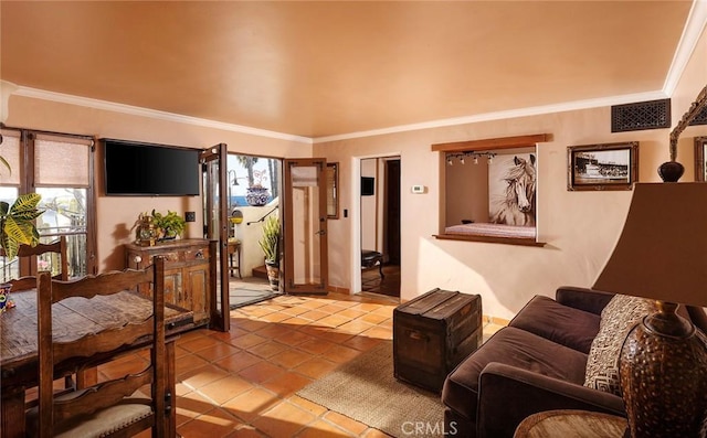 tiled living room with visible vents and ornamental molding