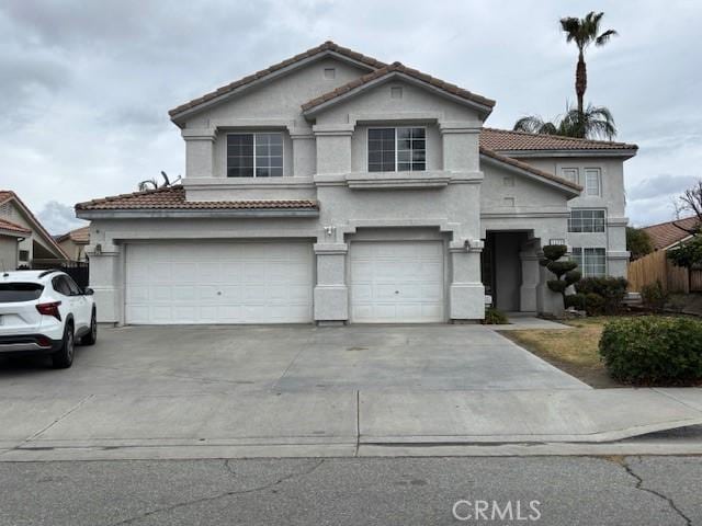 front of property with a garage