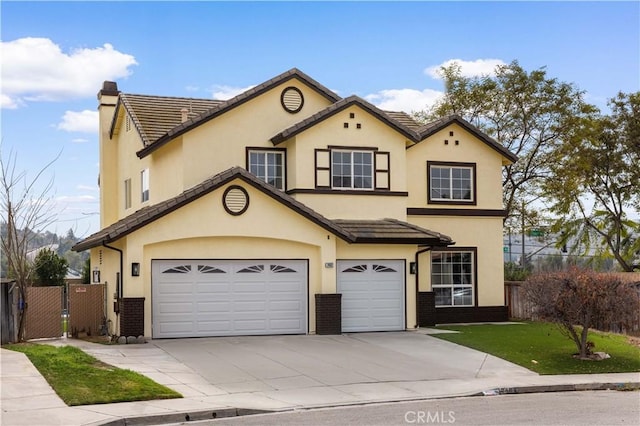 view of front of property with a garage