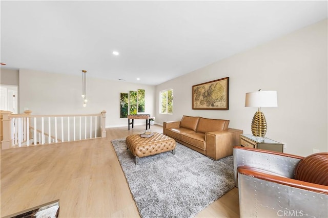 living room with light hardwood / wood-style flooring