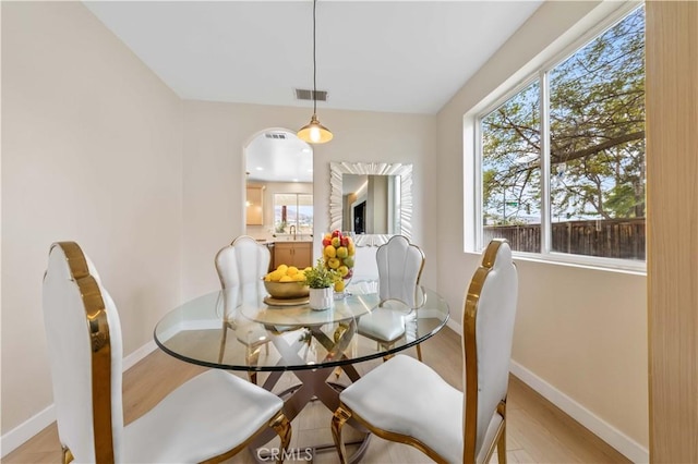 dining room featuring light hardwood / wood-style floors