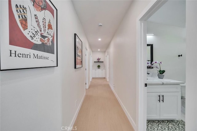 hall featuring light hardwood / wood-style flooring